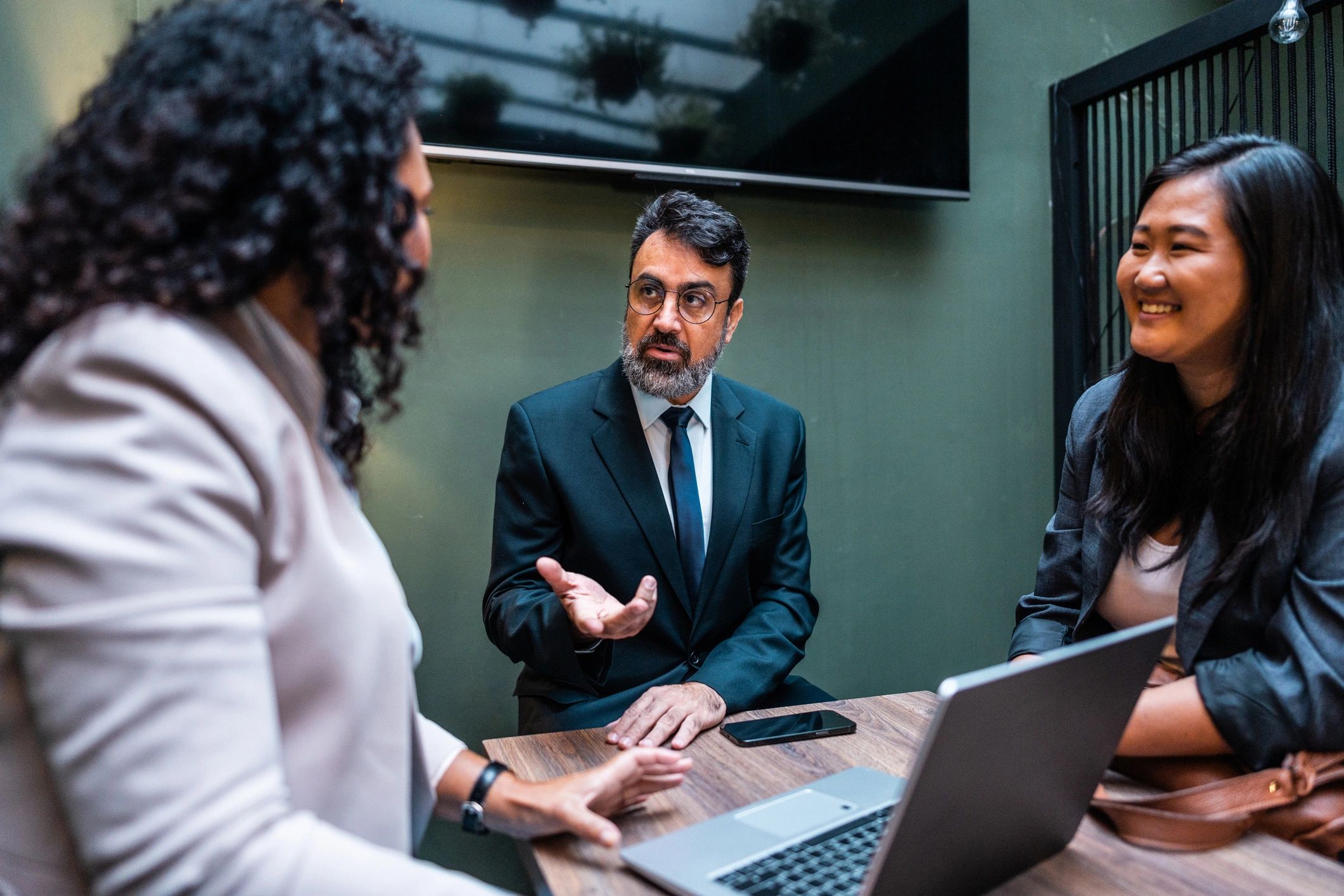 Professionals collaborating during a meeting