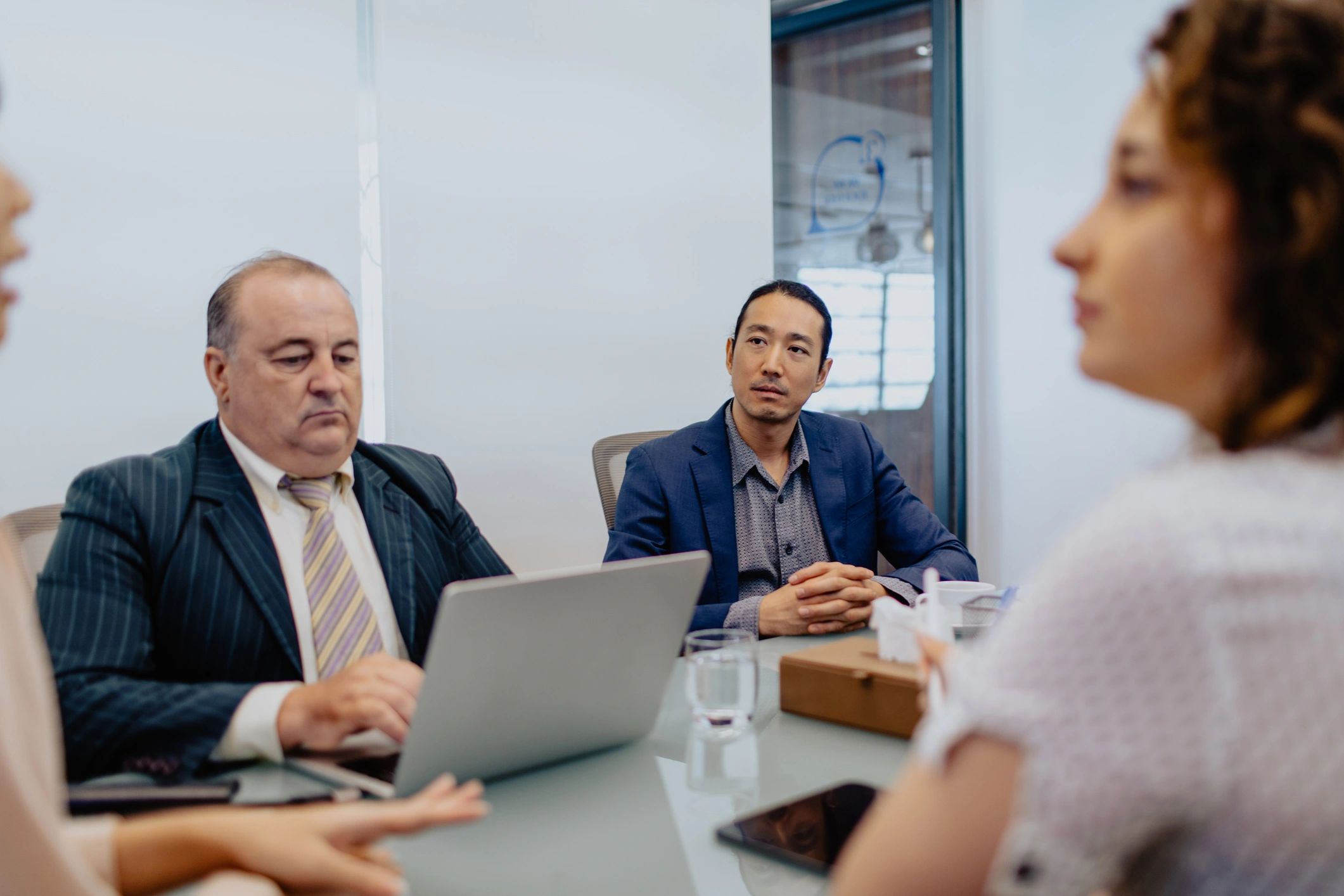Business professional listening during a meeting