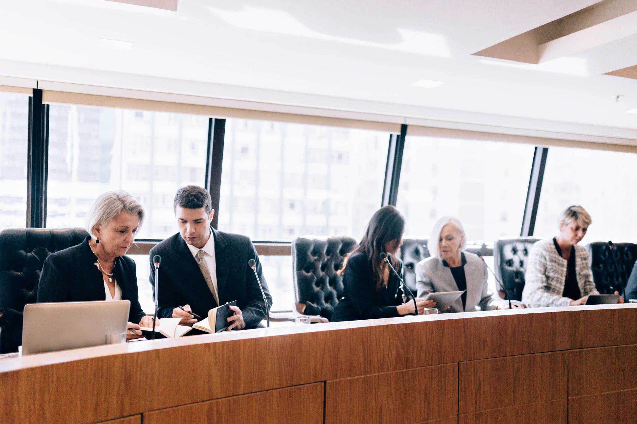 Leadership team meeting in a modern boardroom